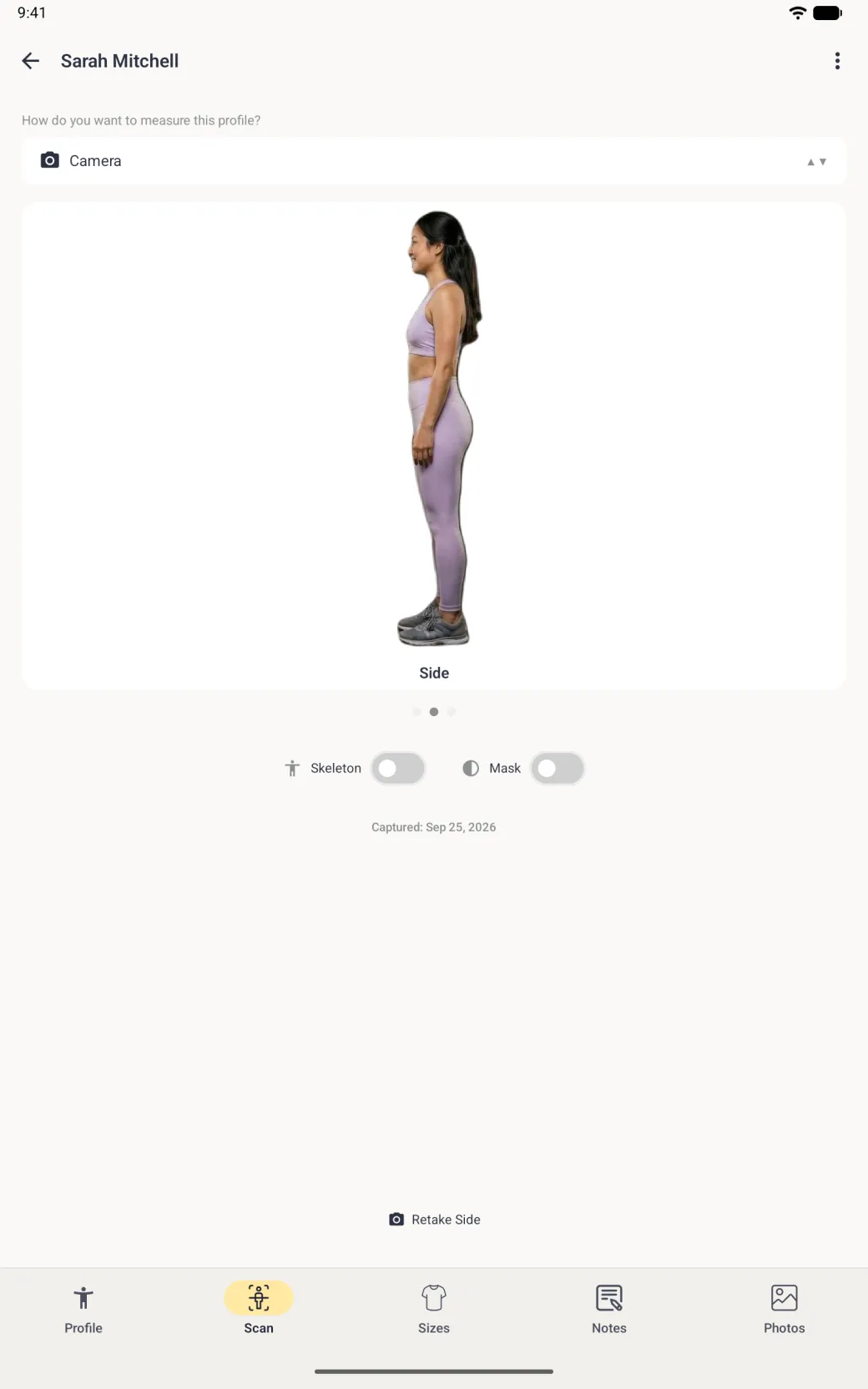 A full-screen Scan tab showing the side-view photo of the scan labelled Side, with the middle of three page dots filled in, both switches off and the link at the foot renamed Retake Side.