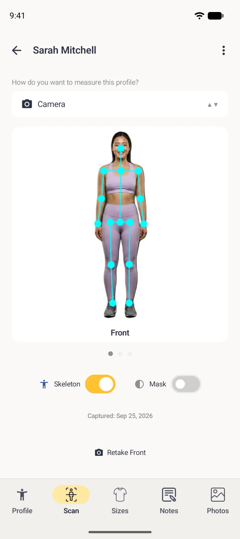 The same cut out photo with cyan dots on the nose, shoulders, elbows, wrists, hips, knees and ankles joined by cyan lines, and the Skeleton switch on in gold.