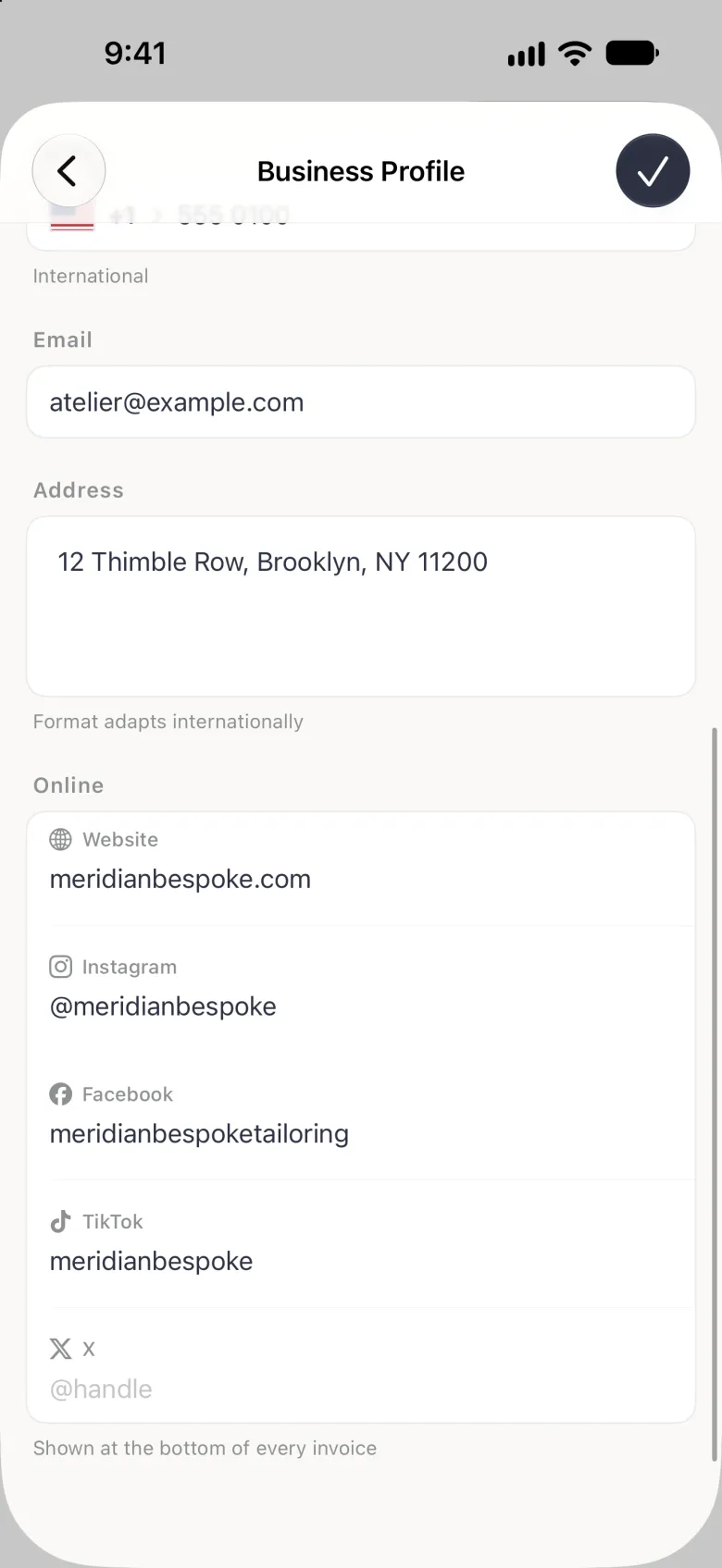 Business Profile scrolled to the Online section under the back and checkmark buttons, showing Email, Address 12 Thimble Row, Brooklyn, NY 11200, then Website meridianbespoke.com, Instagram @meridianbespoke, Facebook meridianbespoketailoring, TikTok meridianbespoke and an empty X field with the placeholder @handle, each label beside its platform logo, above the note Shown at the bottom of every invoice.