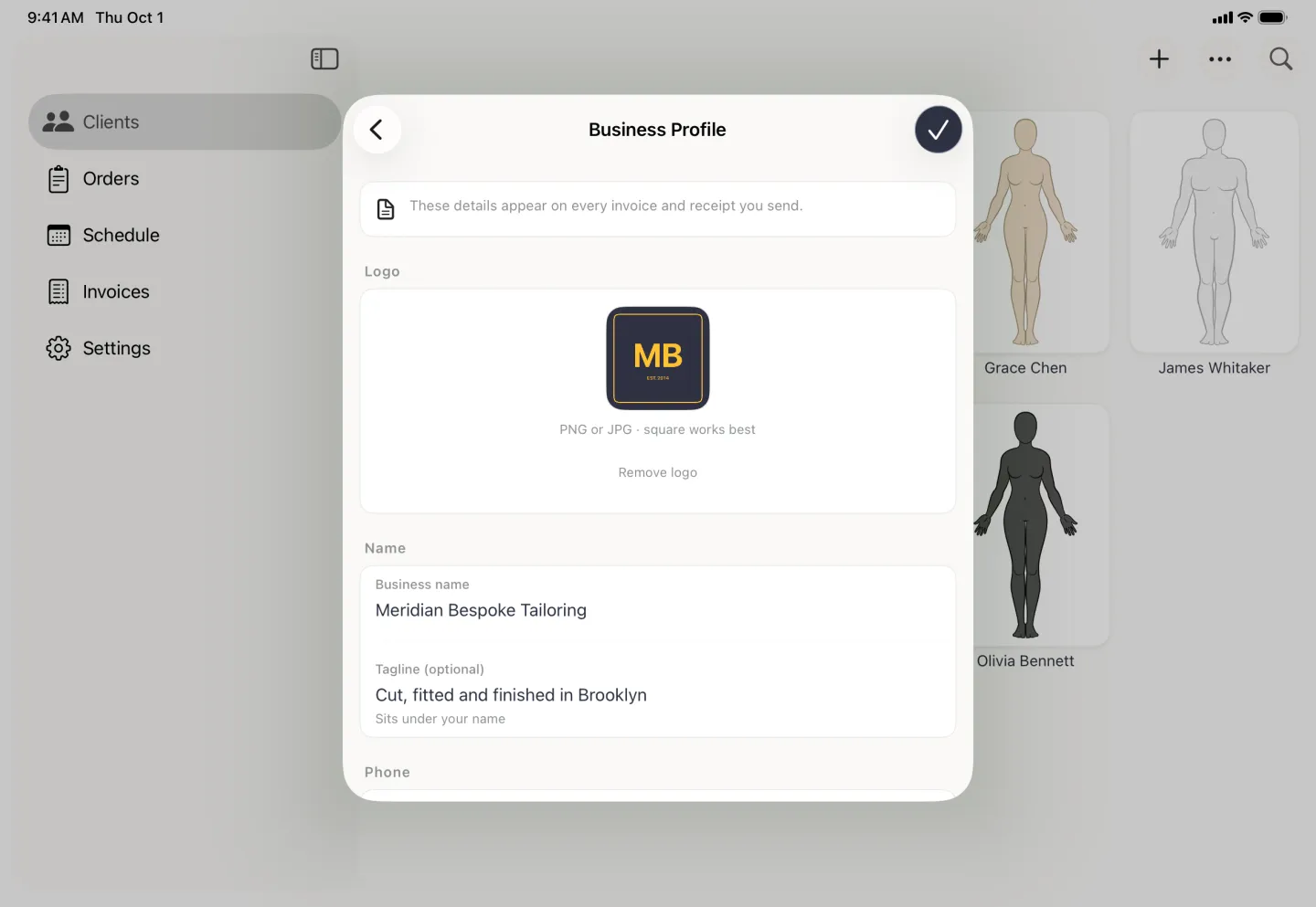 Business Profile editor as a centred card beside the Clients sidebar, showing a navy and gold MB monogram logo, the business name Meridian Bespoke Tailoring and the tagline Cut, fitted and finished in Brooklyn, above a phone row with a United States flag and the code plus 1.