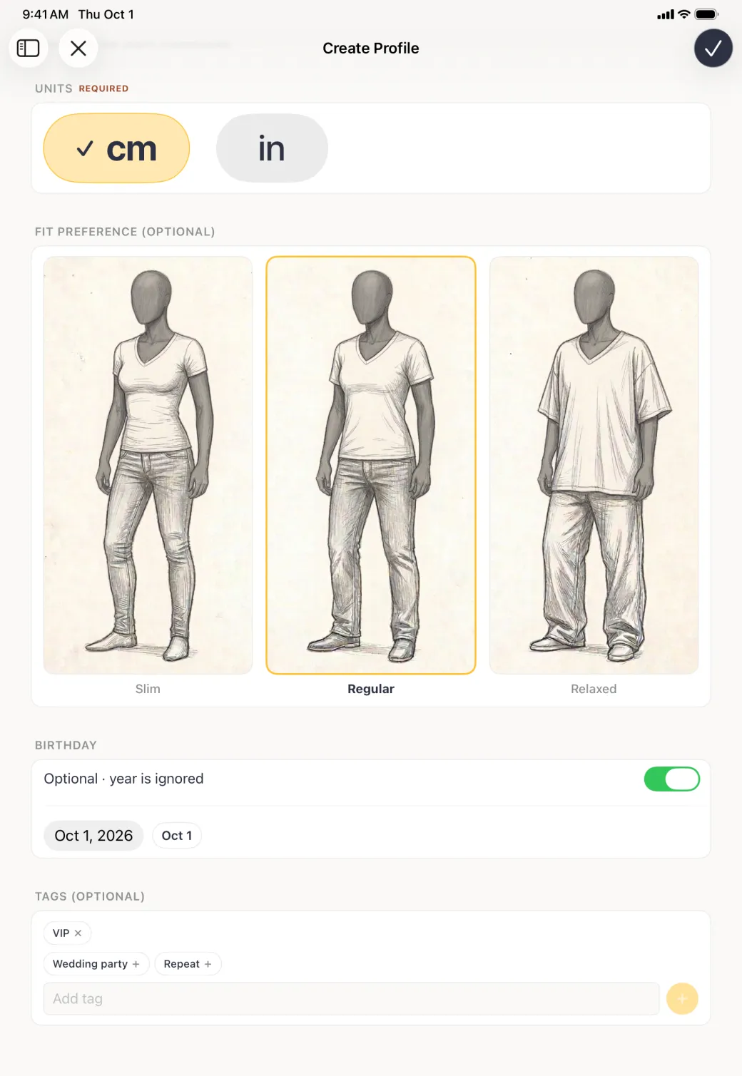 Lower part of the Create Profile form with Regular outlined in gold under Fit Preference, the Birthday toggle on above a Sep 18 date chip, an applied VIP tag with a cross, and remaining suggestions for Wedding party and Repeat.