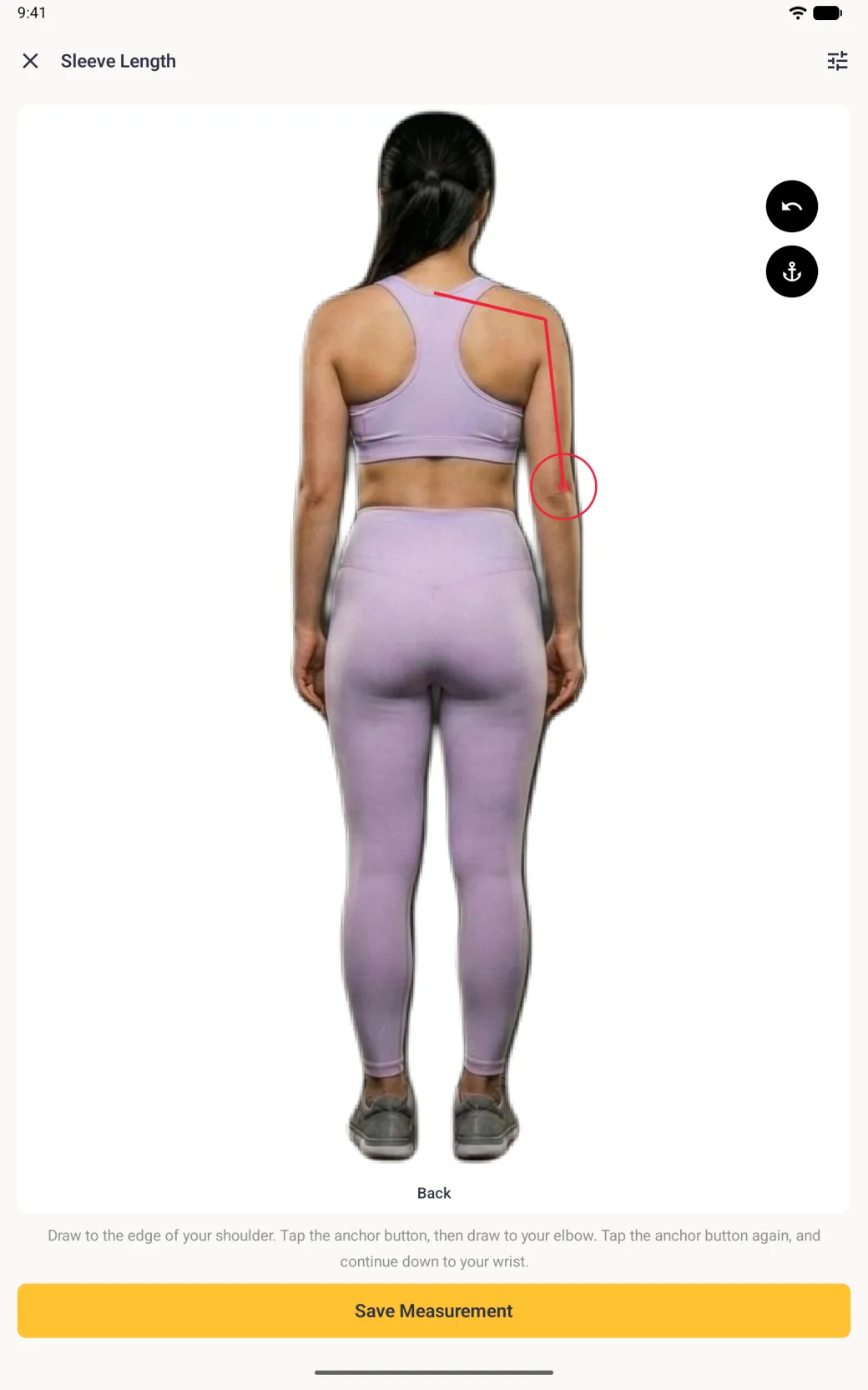 The same back view with the red line now ending at the elbow, from the neck to the shoulder and down the upper arm, with the red target circle at the elbow; the forearm segment is gone.