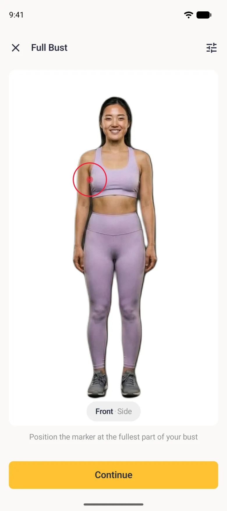 A front scan photo of a woman in a lilac sports top and leggings on a white card, with a red target circle over the left side of her bust, a Front and Side pill below the photo, the instruction Position the marker at the fullest part of your bust and a yellow Continue button.
