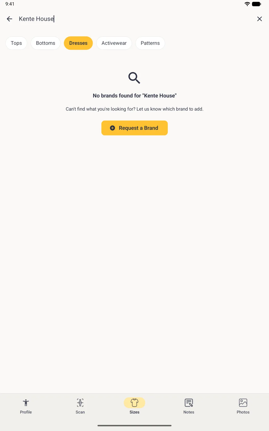 A no results screen under the search bar reading Kente House, with a magnifying glass icon, the line No brands found for Kente House, an invitation to say which brand to add and a yellow Request a Brand button.