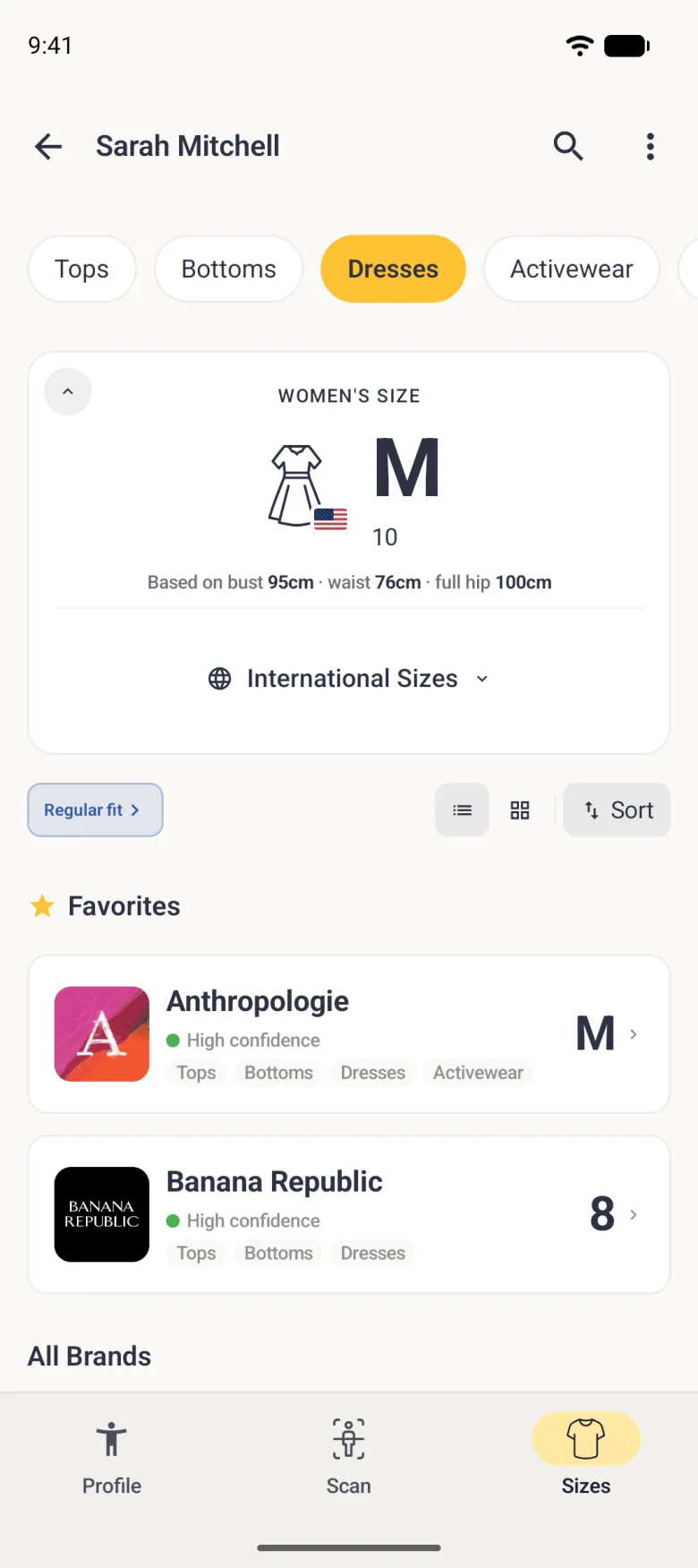 A Sizes tab with the Dresses chip selected in yellow, showing a dress icon beside the size L and the bust 95cm, waist 76cm and full hip 100cm figures behind it, above brand rows for H and M, Gap and About You.