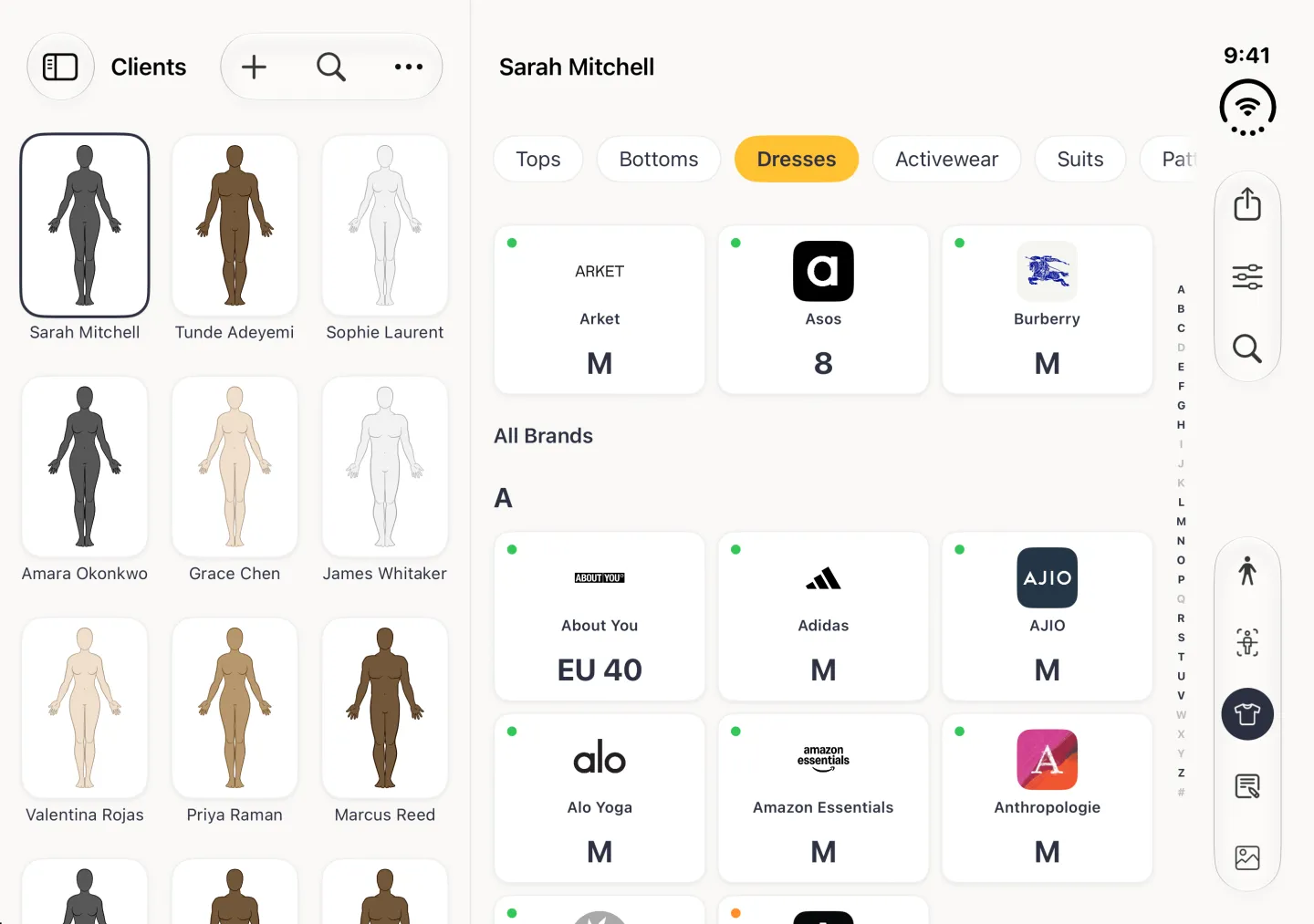 Sizes section of the split view in grid layout sorted A to Z: three favourite cards for Arket M, Asos 8 and Burberry M under the Dresses chip, then All Brands under the heading A with About You EU 40, Adidas M, AJIO M, Alo Yoga M, Amazon Essentials M and Anthropologie M, and an alphabet index running down the right side beside the vertical bar strip.