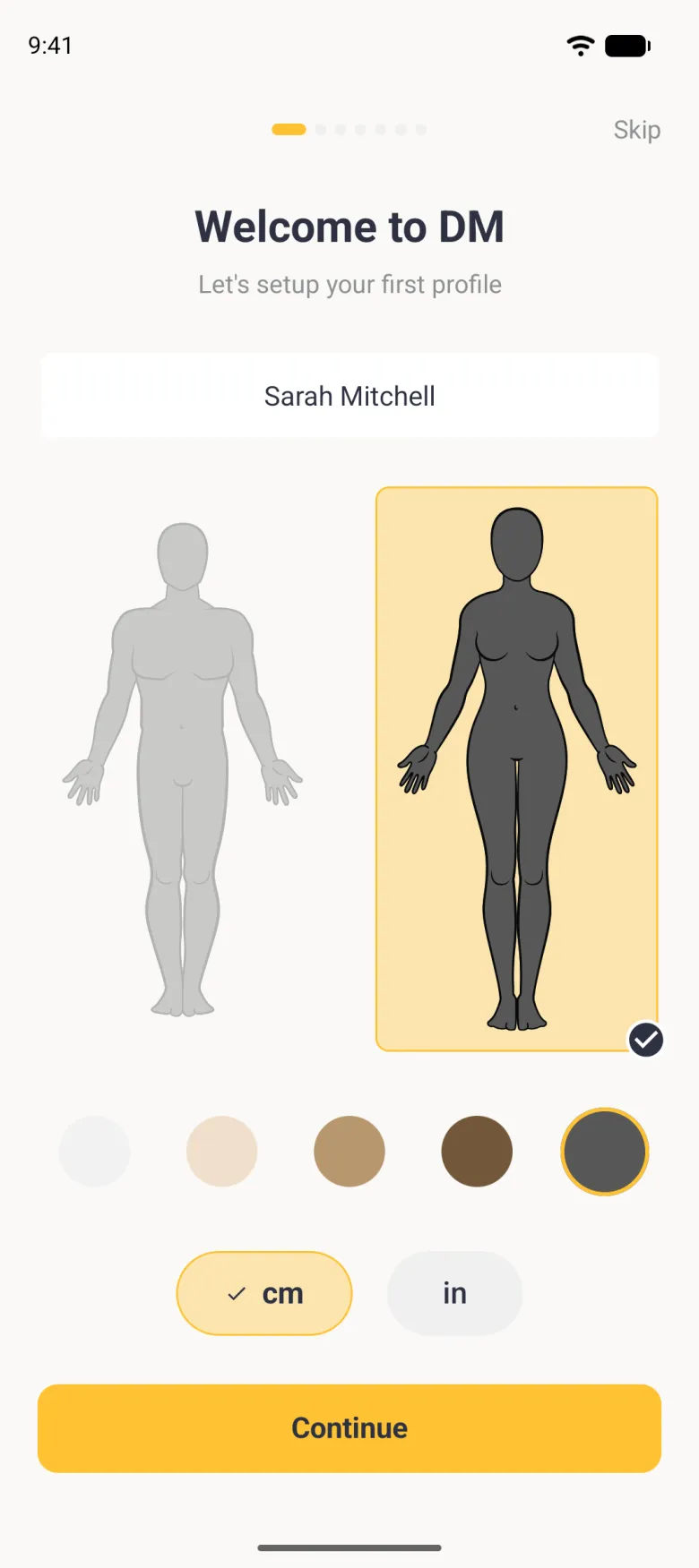Welcome screen with the woman outline filled charcoal on a gold card and the man outline in grey, the charcoal skin tone ringed in gold, cm ticked in a gold pill, and a gold Continue button at the bottom.