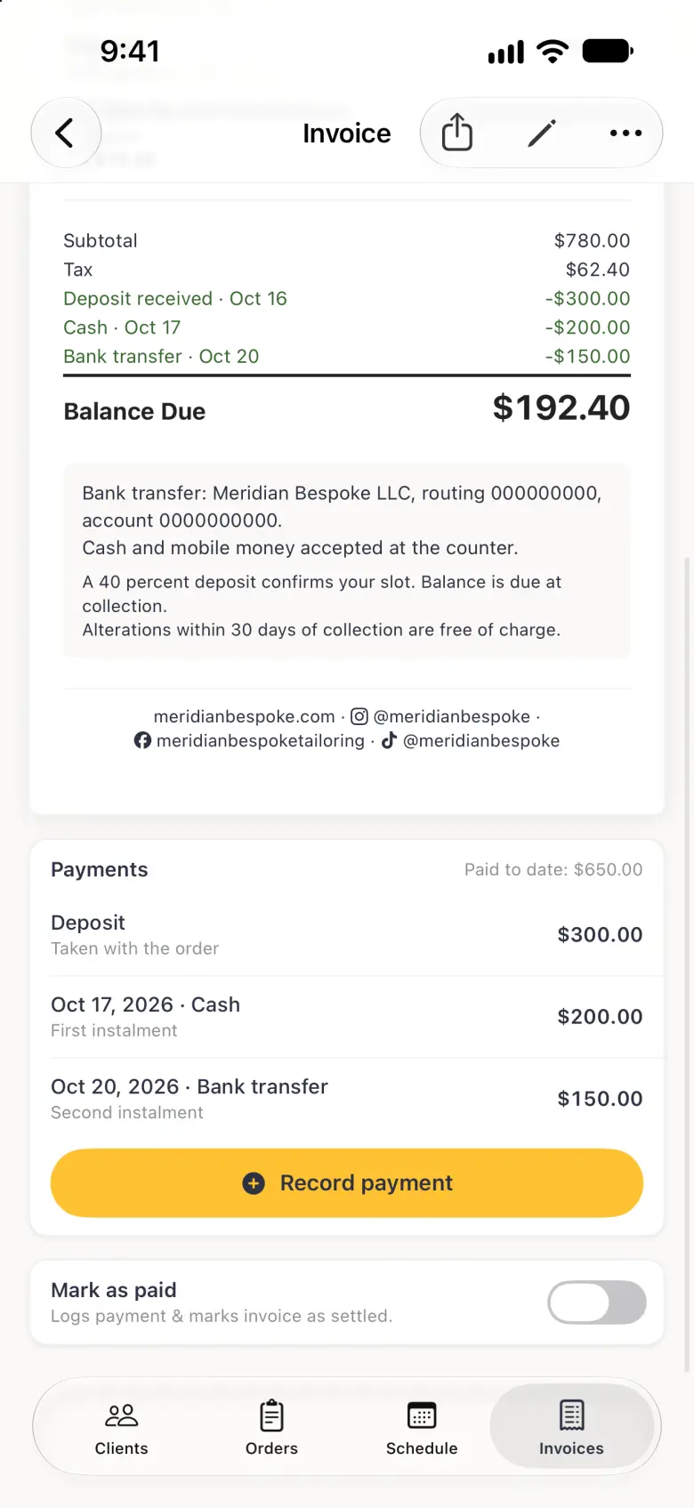The lower part of invoice INV-5 under the top bar with Back, Invoice, Share, Edit and More: the totals ending in a Balance Due of $192.40, a pale plate with the bank transfer details and payment terms, then a centred footer reading meridianbespoke.com, @meridianbespoke with the Instagram logo, meridianbespoketailoring with the Facebook logo and @meridianbespoke with the TikTok logo. Below the document sit the Payments card with the deposit and two instalments and a gold Record payment button, and the Mark as paid card with its switch off.