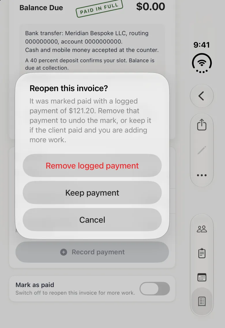 Invoice INV-2 on the closed iPhone Duo dimmed behind an alert titled Reopen this invoice?, explaining that it was marked paid with a logged payment of $121.20 and offering three stacked buttons: Remove logged payment in red, Keep payment and Cancel. The PAID IN FULL stamp and the Mark as paid switch, now off, show behind the alert, with the bar strip buttons dimmed on the right edge.