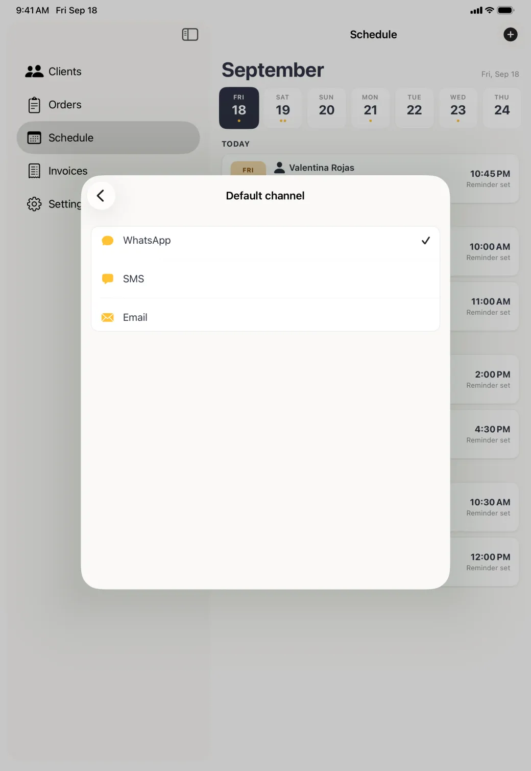 Default channel card centred over the dimmed Schedule, listing WhatsApp, SMS and Email, each with a gold icon, and a tick beside WhatsApp.