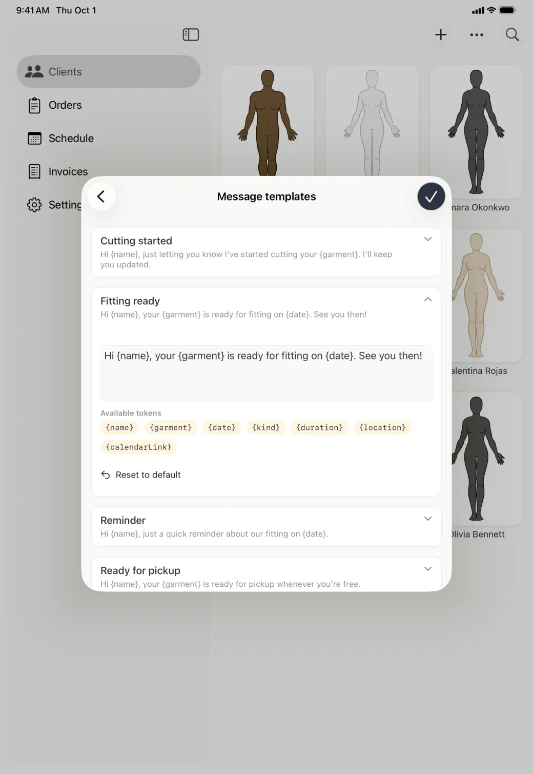 Expanded Fitting ready template inside the centred card, with an editable text box, seven gold token chips labelled name, garment, date, kind, duration, location and calendarLink wrapping over two rows under Available tokens, and a Reset to default link with a back-arrow icon.