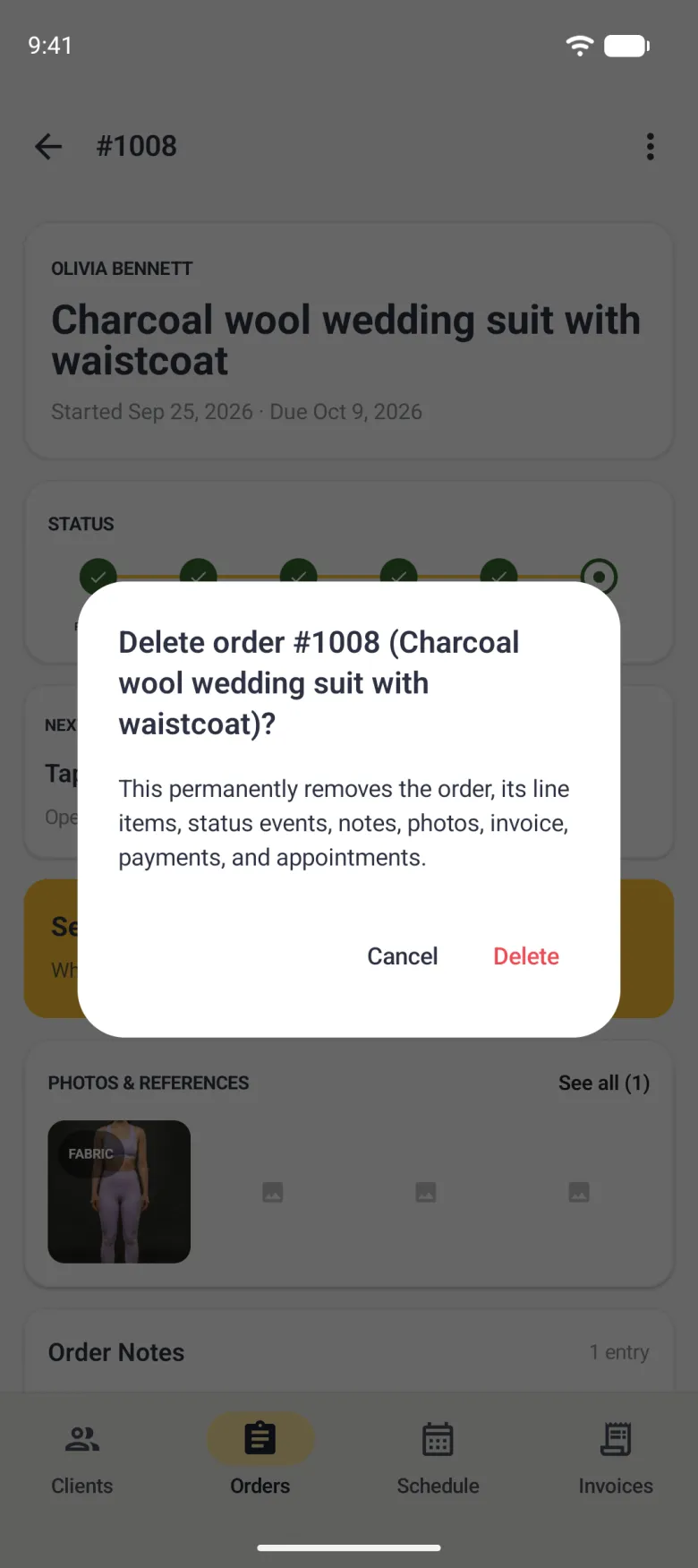 Delete order #1008 (Charcoal wool wedding suit with waistcoat)? dialog over the dimmed order detail, explaining that this permanently removes the order, its line items, status events, notes, photos, invoice, payments and appointments, with Cancel and a red Delete.