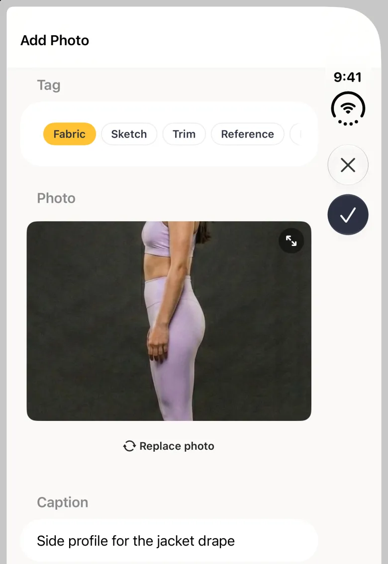 Add Photo sheet on the closed iPhone Duo with the Fabric tag selected, a side-profile body photo filling the preview with an expand button in its corner, a Replace photo link below it, and a caption reading Side profile for the jacket drape at the bottom edge; the close button and the round tick, now solid navy, sit in the vertical bar strip on the right edge.