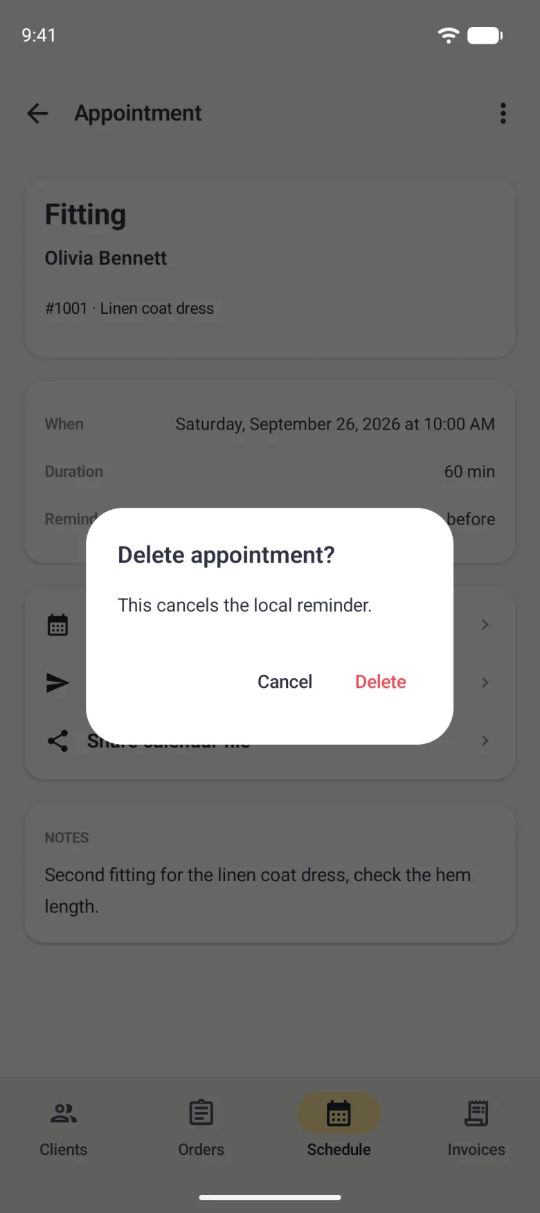 Centred white dialog over the dimmed Appointment detail reading Delete appointment? with the line This cancels the local reminder, and two text buttons, Cancel in navy and Delete in red.
