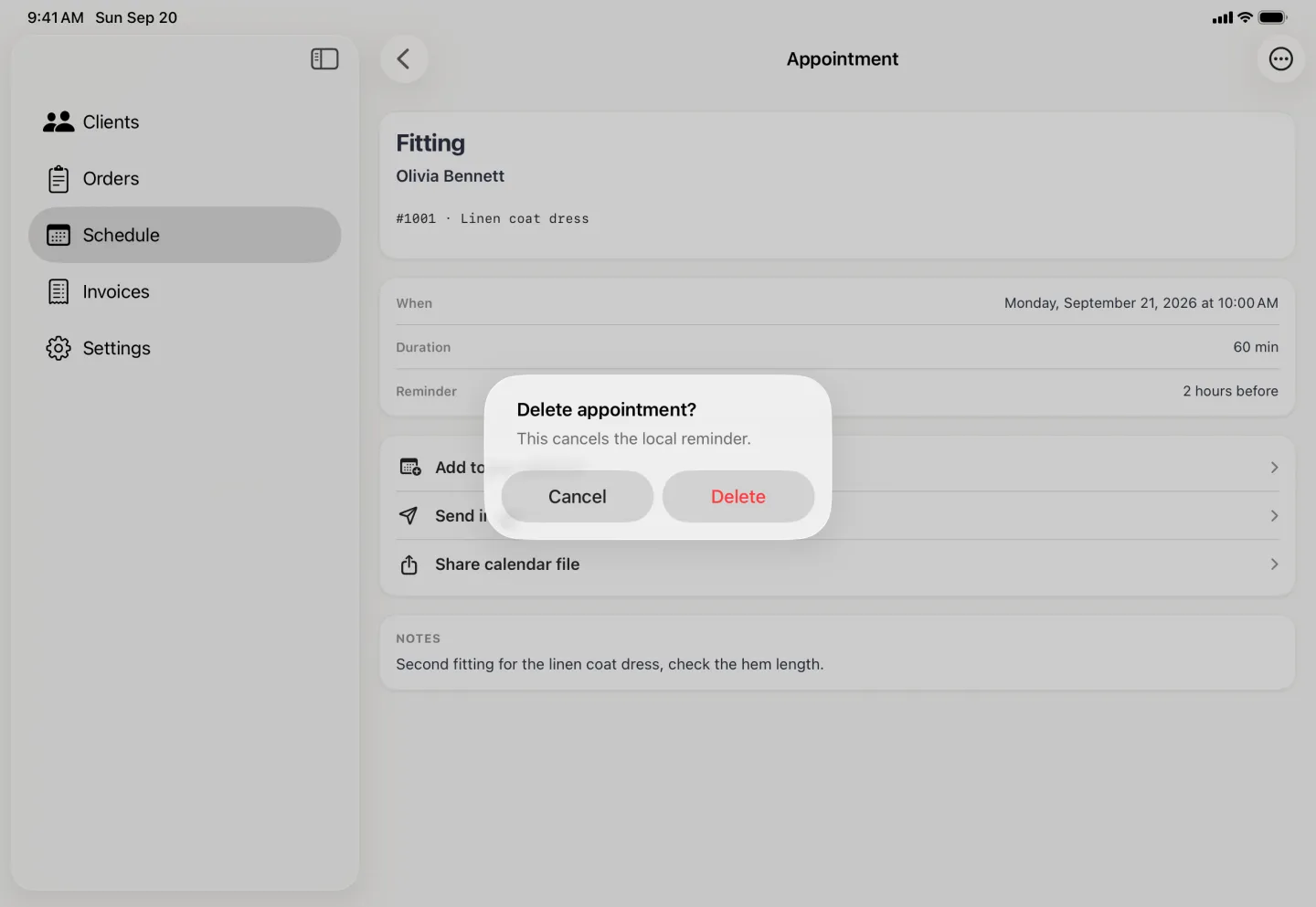 Alert centred over the dimmed appointment detail reading Delete appointment? with the line this cancels the local reminder, and Cancel and Delete buttons side by side, Delete in red.