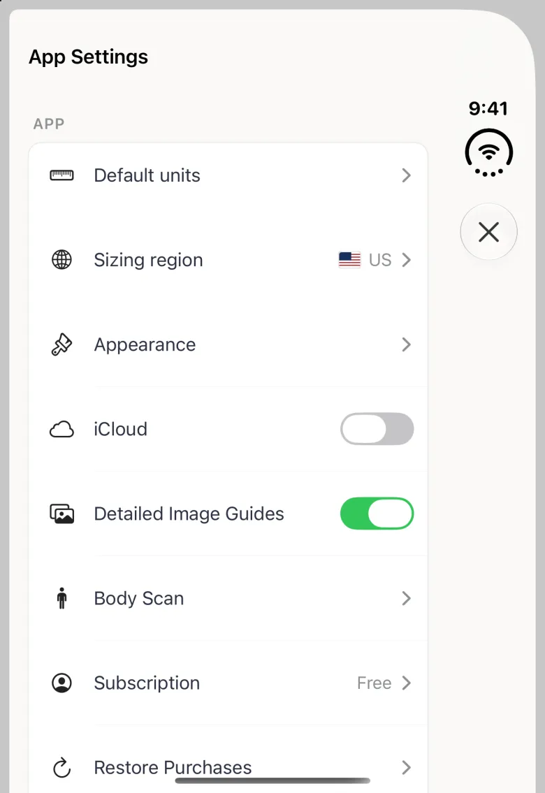 App Settings sheet on the closed Duo with the title at the top left and a close button in the vertical bar strip on the right, and an APP card listing Default units, Sizing region with a US flag and US, Appearance, an iCloud switch turned off, Detailed Image Guides switched on, Body Scan, Subscription Free and Restore Purchases, which runs on below the bottom edge.