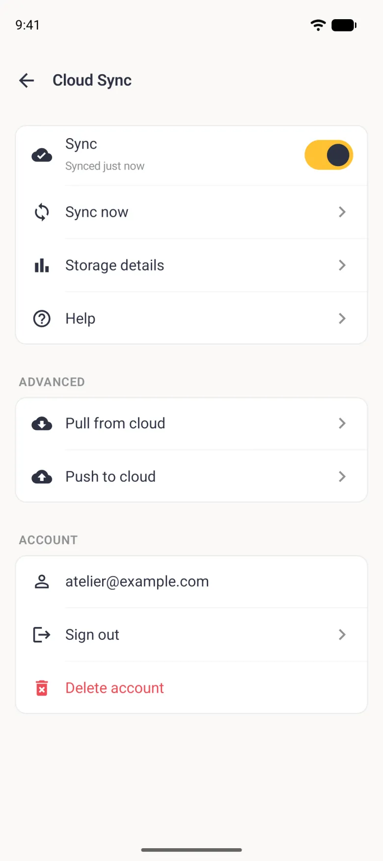 Cloud Sync screen with the Sync switch on and Synced just now under it, rows for Sync now, Storage details and Help, an Advanced group with Pull from cloud and Push to cloud, and an Account group showing atelier@example.com, Sign out and a red Delete account.