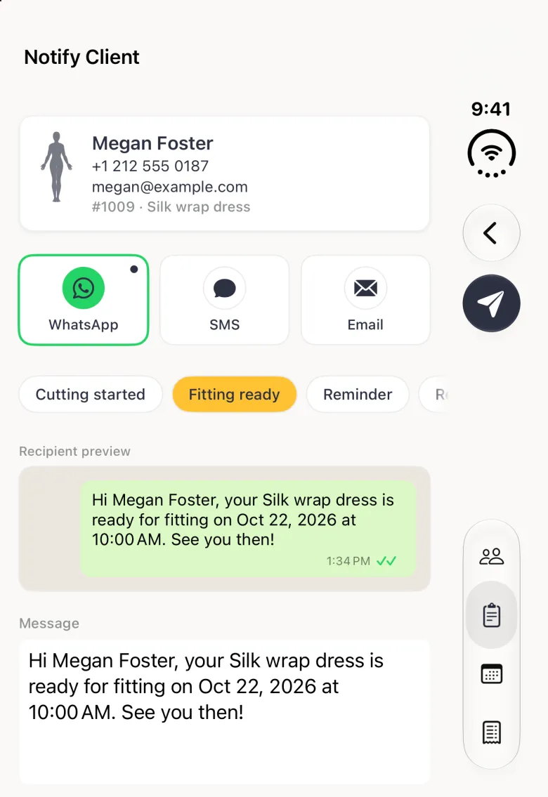 Notify Client screen on the closed iPhone Duo with a back chevron and a navy paper-plane send button stacked in the vertical bar strip on the right edge, a card for Megan Foster with her phone, email and order 1009 Silk wrap dress, WhatsApp selected with a green outline, the Fitting ready chip highlighted in gold, a WhatsApp style preview bubble, and a message reading Hi Megan Foster, your Silk wrap dress is ready for fitting on Oct 22, 2026 at 10:00 AM. See you then.