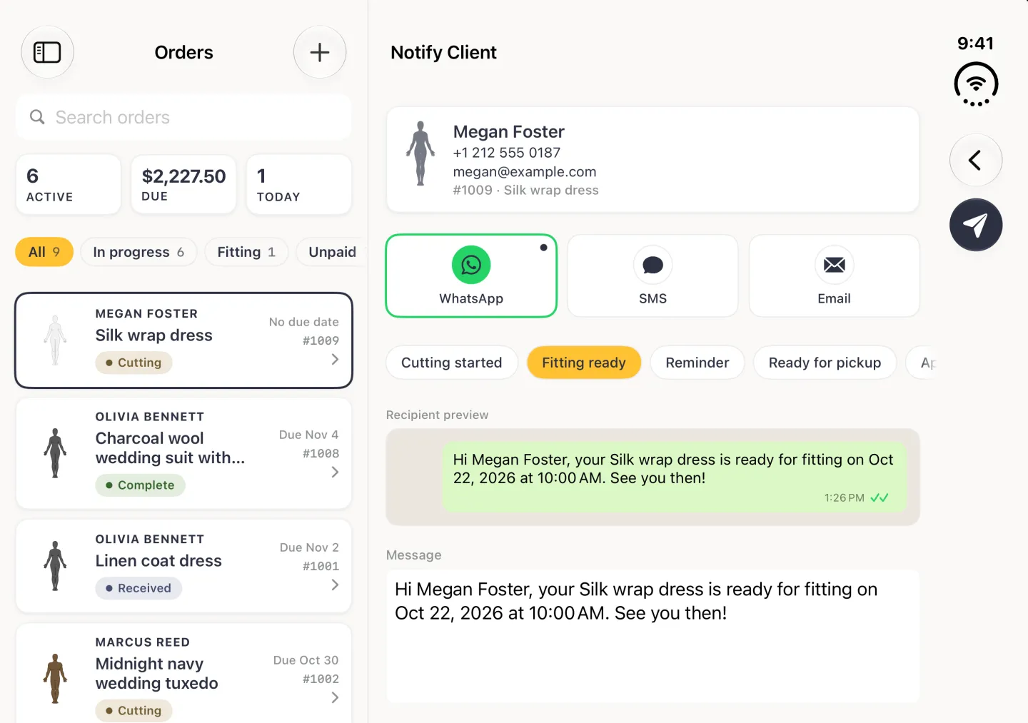 Notify Client in the pane beside the Orders column in landscape, with a back chevron and a navy paper-plane send button in the vertical bar strip on the right edge, a card for Megan Foster with her phone, email and #1009 Silk wrap dress, WhatsApp selected with a green outline, the Fitting ready chip highlighted in gold, a WhatsApp style preview bubble, and a message reading Hi Megan Foster, your Silk wrap dress is ready for fitting on Oct 22, 2026 at 10:00 AM. See you then.