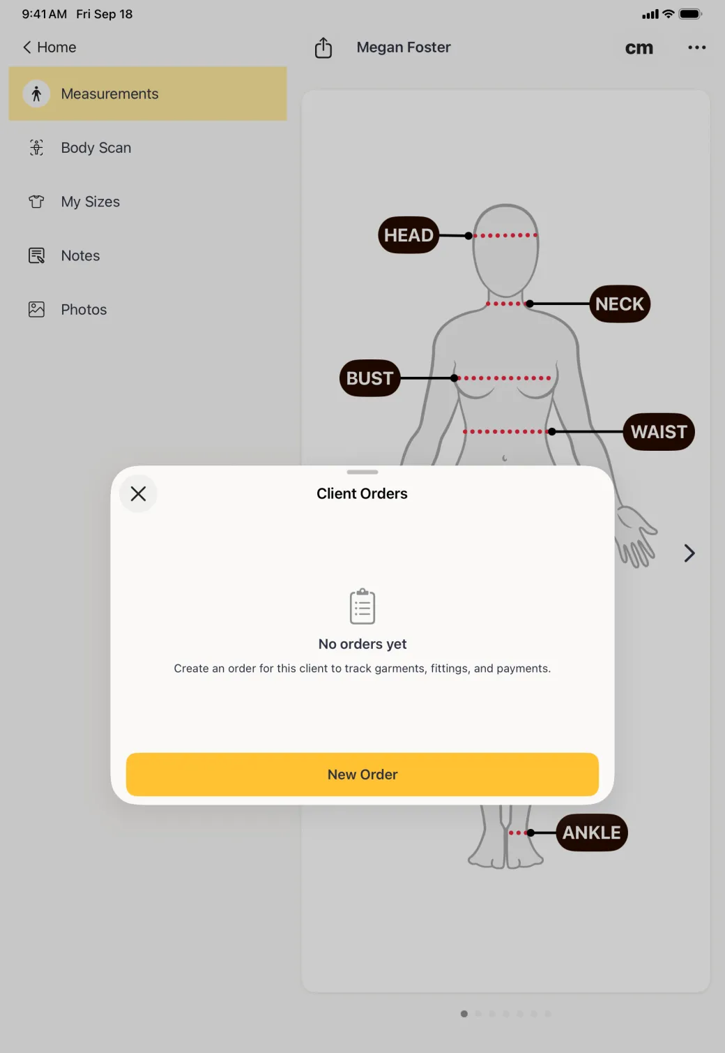 Card titled Client Orders centred over Megan Foster's dimmed profile, reading No orders yet above the line Create an order for this client to track garments, fittings, and payments, with a gold New Order button along the bottom and a close cross at the top left.